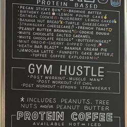 Unlimited Nutrition - Shakes and Protein Coffee menu on chalkboard in store