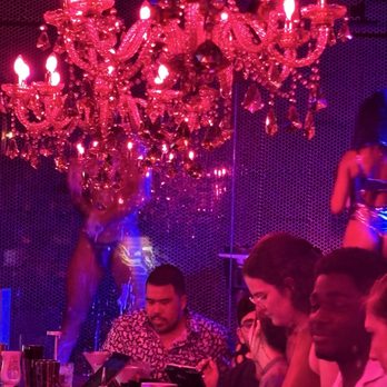 The Ball - Enclosed shower with dancers - Cocktail Bars Near Me - St. Petersburg, Florida