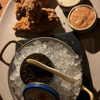 The Guest House Austin - Caviar service with chicken tenders - New American Near Me - Austin, Texas