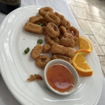 Sand Pebbles Restaurant - Calamari (partially eaten) - Sushi Bars Near Me - Aurora, Ohio Sand Pebbles Restaurant - Calamari (partially eaten) - Sushi Bars Near Me - Aurora, Ohio
