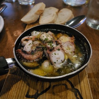 Toro Kitchen + Bar - Octopus in Garlic oil. My husband's favorite. - Tapas Bars Near Me - San Antonio, Texas Toro Kitchen + Bar - Octopus in Garlic oil. My husband's favorite. - Tapas Bars Near Me - San Antonio, Texas