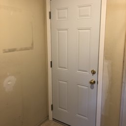 After - House door leading into garage (ready to paint)