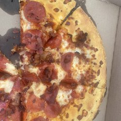 Domino's Pizza - Maybe the worker today was in a bad mood. Or they ran out of cheese and tomato sauce