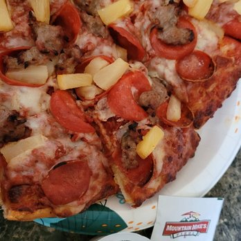 Mountain Mike's Pizza - Pepperoni pizza with pineapple and italian sausage added. - Pizza Near Me - Fresno, California Mountain Mike's Pizza - Pepperoni pizza with pineapple and italian sausage added. - Pizza Near Me - Fresno, California
