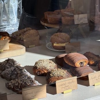 Moulin - (left to right) Almond, hazelnut croissant, espresso and cream croissant (raspberry to the far right, & egg sandwich in back - Bakeries Near Me - Napa, California Moulin - (left to right) Almond, hazelnut croissant, espresso and cream croissant (raspberry to the far right, & egg sandwich in back - Bakeries Near Me - Napa, California