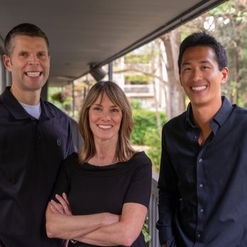 Manson & Chi Dentistry - Dr. Theron (left), Dr. Connie (middle), and Dr. David (right), smiling. - General Dentistry Near Me - Kirkland, Washington Manson & Chi Dentistry - Dr. Theron (left), Dr. Connie (middle), and Dr. David (right), smiling. - General Dentistry Near Me - Kirkland, Washington