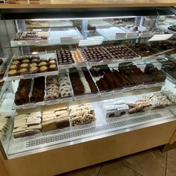 Rocky Mountain Chocolate Factory - Display case of chocolates