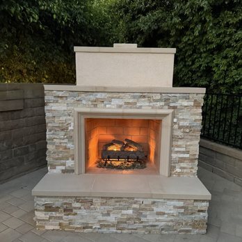 Reid Concrete Construction - Stacked stone vented propane fueled fireplace - General Contractors Near Me Reid Concrete Construction - Stacked stone vented propane fueled fireplace - General Contractors Near Me