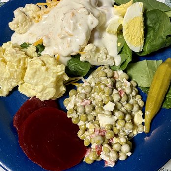 Butter Churn Restaurant - Fresh spinach, boiled egg slices, pickled okra, pea salad, pickled beets, potato salad (many more options) - American Near Me - Sinton, Texas