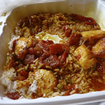 Paseo - Scallops in Red Sauce over Rice - Caribbean Near Me - Seattle, Washington Paseo - Scallops in Red Sauce over Rice - Caribbean Near Me - Seattle, Washington