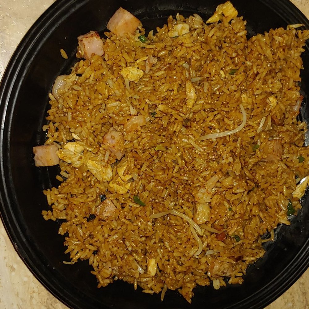 House special fried rice with chicken, ham, pork, and shrimp. House special fried rice with chicken, ham, pork, and shrimp.