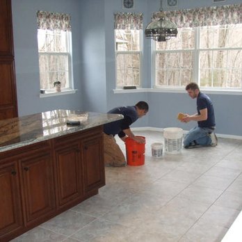 Hood Floors - two men working on a kitchen floor - Carpeting Near Me - Lambertville, New Jersey Hood Floors - two men working on a kitchen floor - Carpeting Near Me - Lambertville, New Jersey