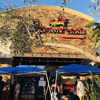 The Kickin' Crab - group of people under umbrellas - Cajun/Creole Near Me - Irvine, California The Kickin' Crab - group of people under umbrellas - Cajun/Creole Near Me - Irvine, California