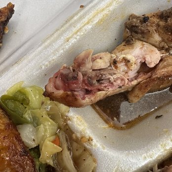 876 Jerk - Jerk chicken - chicken was not fully cooked. - Caribbean Near Me - Jensen Beach, Florida