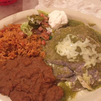 Chuy's - Stacked chicken enchiladas are yummy! The beans and rice were not my fav but the enchiladas were very filling by themselves! - Tex-Mex Near Me - Corpus Christi, Texas