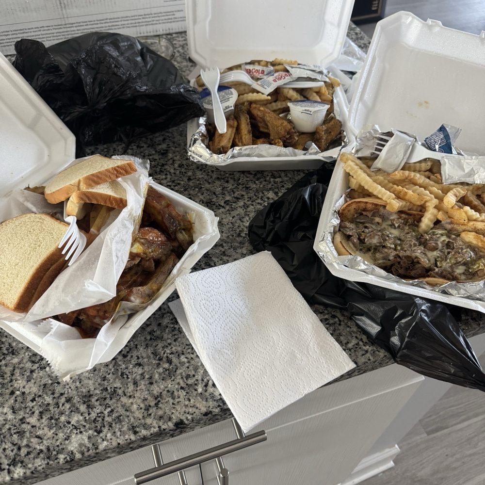 Quikys Famous BBQ - Half rack of ribs, lemon pepper wings, and Philly cheesesteak - Barbeque Near Me - Savannah, Georgia Quikys Famous BBQ - Half rack of ribs, lemon pepper wings, and Philly cheesesteak - Barbeque Near Me - Savannah, Georgia