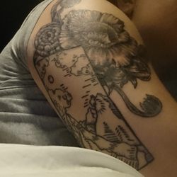 Rogue Tattoo - Beautiful flowers and a great landscape complete with a (not to scale) goat. ;)