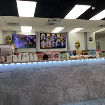Mardi Gras Cajun Cuisine - The counter showing different desserts etc. - Cajun/Creole Near Me - Dallas, Texas Mardi Gras Cajun Cuisine - The counter showing different desserts etc. - Cajun/Creole Near Me - Dallas, Texas