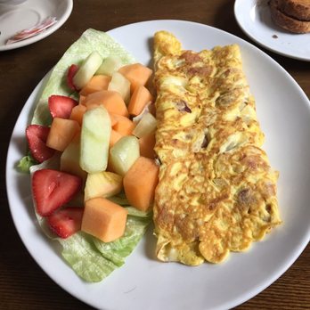 Daisy's Grill - Bacon, onion, and cheddar omelette with fruit salad. Fresh fruit not from a can. Cooked to perfection. - Sandwiches Near Me - Edgewater, New Jersey Daisy's Grill - Bacon, onion, and cheddar omelette with fruit salad. Fresh fruit not from a can. Cooked to perfection. - Sandwiches Near Me - Edgewater, New Jersey