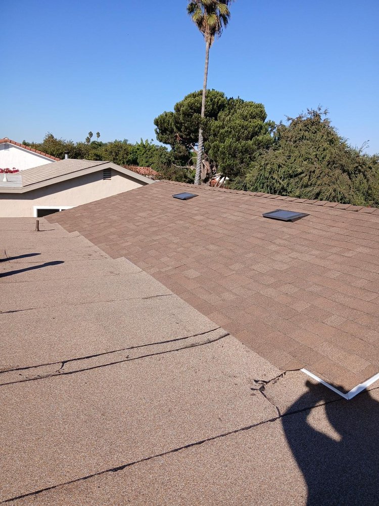 Slide of Mister Roofing