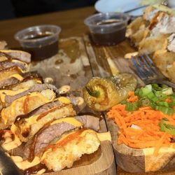 Sushinaloa - Food. House special roll and Cachichurris