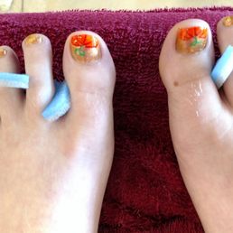 Natalie did my nails! I asked for a pumpkin and was so happy with the results!!! Natalie did my nails! I asked for a pumpkin and was so happy with the results!!!