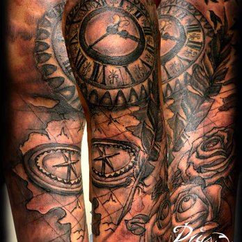 Tatouage Calypso - Horloge et boussole sur carte avec roses. - Tattoo Near Me - Quebec City, Quebec Tatouage Calypso - Horloge et boussole sur carte avec roses. - Tattoo Near Me - Quebec City, Quebec