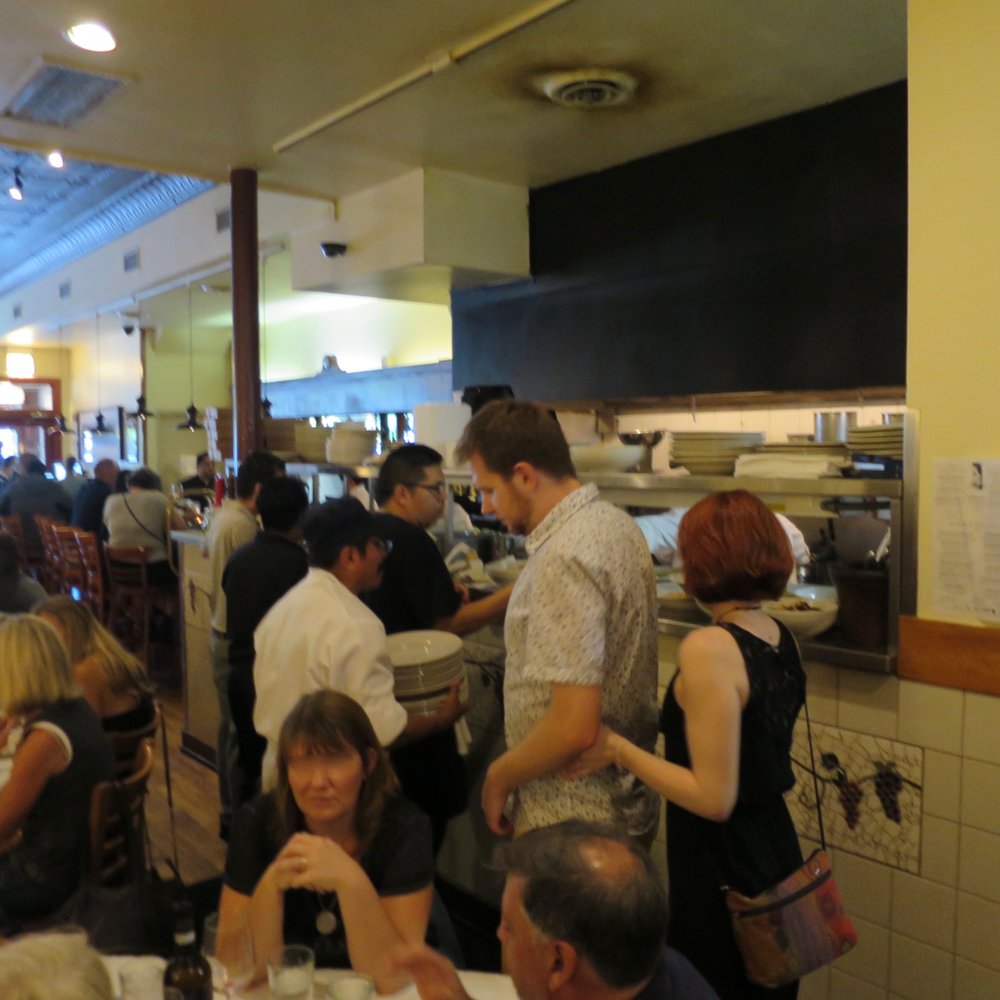 Mia Francesca - Open kitchen counter towards rear of the space. - Italian Near Me - Chicago, Illinois Mia Francesca - Open kitchen counter towards rear of the space. - Italian Near Me - Chicago, Illinois