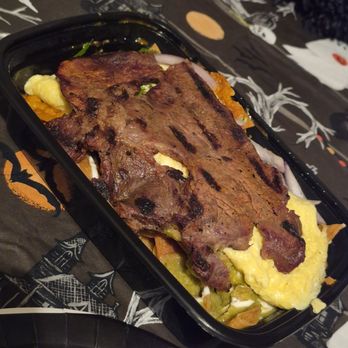 Cafe de la Abuela - Thin dry asada on top of chilaquiles - Cafes Near Me - San Fernando, California Cafe de la Abuela - Thin dry asada on top of chilaquiles - Cafes Near Me - San Fernando, California