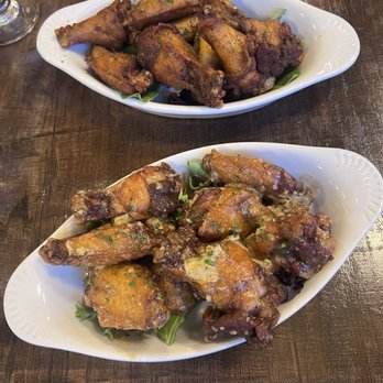 Park 54 Restaurant & Lounge - Garlic parm and Cajun dried rub wings. - Lounges Near Me - Boston, Massachusetts Park 54 Restaurant & Lounge - Garlic parm and Cajun dried rub wings. - Lounges Near Me - Boston, Massachusetts