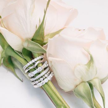 Fink's Jewelers - Forever love. These sparkling diamond eternity bands say "I do" over and over again. - Jewelry Near Me - Chattanooga, Tennessee