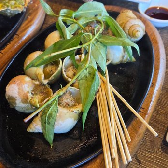 Oc & Lau Restaurant - Grilled Escargot with Garlic Butter & Peppercorn - Vietnamese Near Me - Garden Grove, California Oc & Lau Restaurant - Grilled Escargot with Garlic Butter & Peppercorn - Vietnamese Near Me - Garden Grove, California