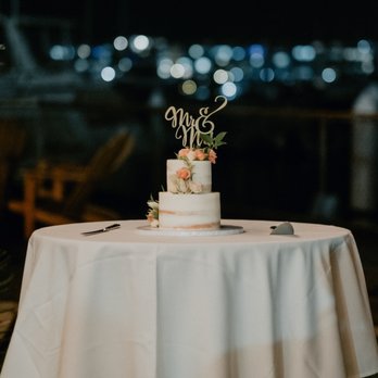 12 Oaks Desserts - a wedding cake on a table - Desserts Near Me