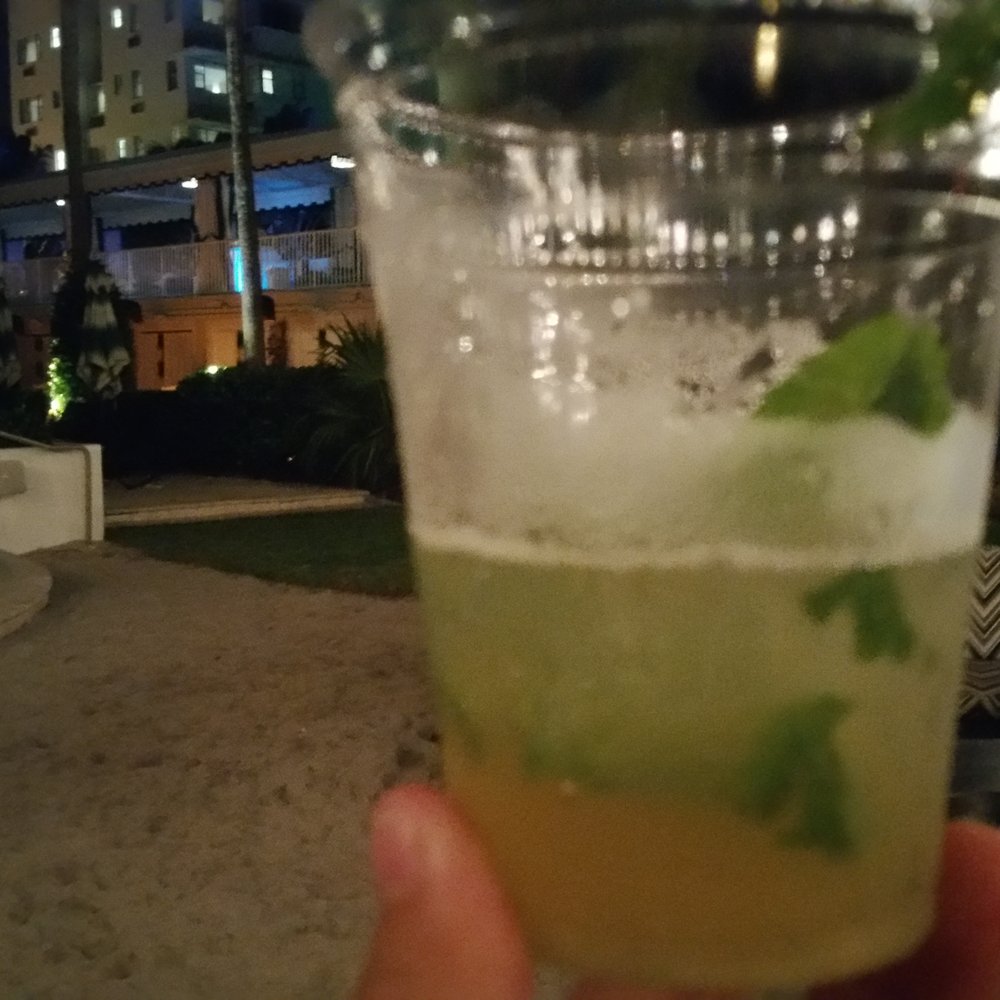 Kimpton Surfcomber Hotel - Working on my dark rum mojito - Hotels Near Me - Miami Beach, Florida Kimpton Surfcomber Hotel - Working on my dark rum mojito - Hotels Near Me - Miami Beach, Florida