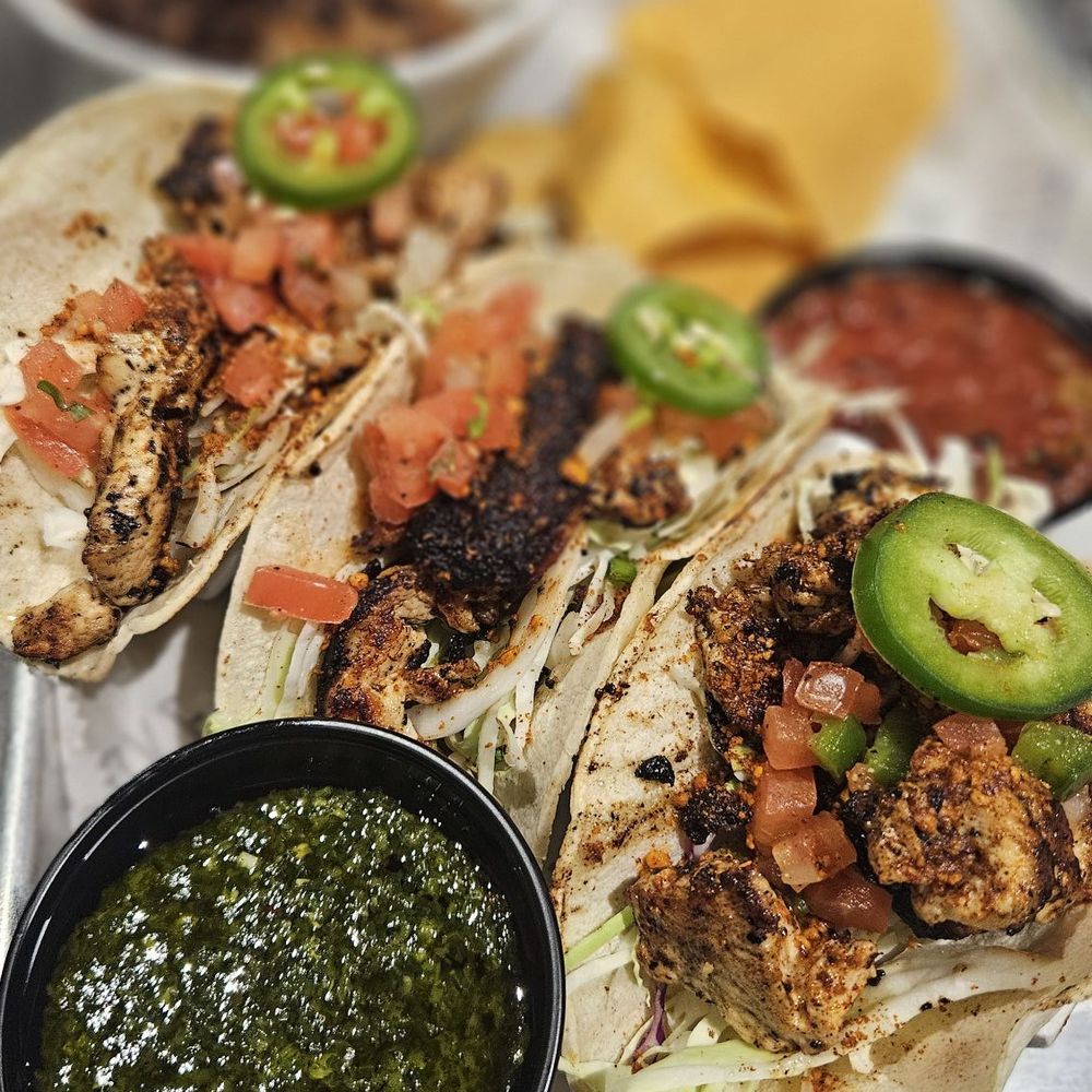 PopStroke - Jerk chicken Tacos - Mini Golf Near Me - Lutz, Florida PopStroke - Jerk chicken Tacos - Mini Golf Near Me - Lutz, Florida