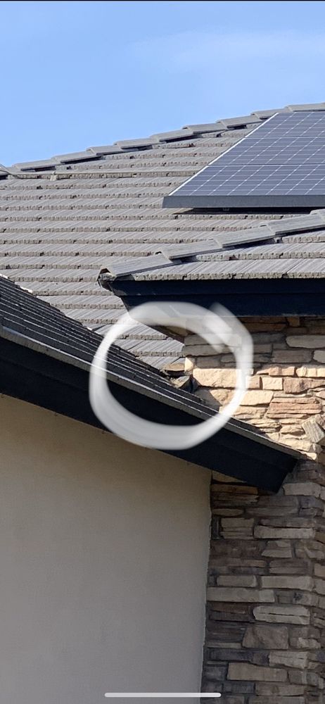 Slide of Woolf Roofing