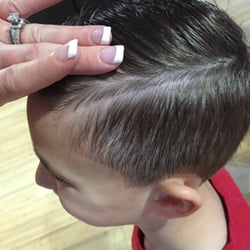 Prestige Barber Shop - The worst barber shop!! Not only did we get rushed the guy fucked my sons hair up! How can you not see where the line originally was?