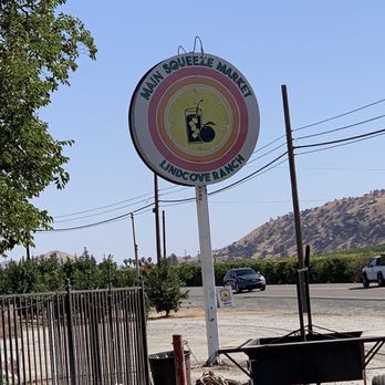 Main Squeeze Market - a sign for a restaurant - Farmers Market Near Me - Lemon Cove, California