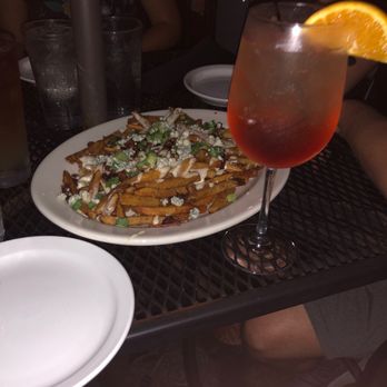 The Publik House - Bacon and blue cheese fries with the winter aperol spritz drink - Gastropubs Near Me - Peoria Heights, Illinois The Publik House - Bacon and blue cheese fries with the winter aperol spritz drink - Gastropubs Near Me - Peoria Heights, Illinois