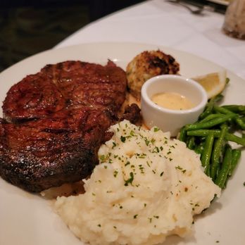 Morton's The Steakhouse - 16 oz Prime Cajun Ribeye with Jumbo Lump Crab Cake, Sour Cream Mashed Potatoes and Green Beans - Steakhouses Near Me - Las Vegas, Nevada Morton's The Steakhouse - 16 oz Prime Cajun Ribeye with Jumbo Lump Crab Cake, Sour Cream Mashed Potatoes and Green Beans - Steakhouses Near Me - Las Vegas, Nevada