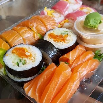 Sushi Newman - a plastic container filled with sushi - Japanese Near Me - Lasalle, Quebec Sushi Newman - a plastic container filled with sushi - Japanese Near Me - Lasalle, Quebec
