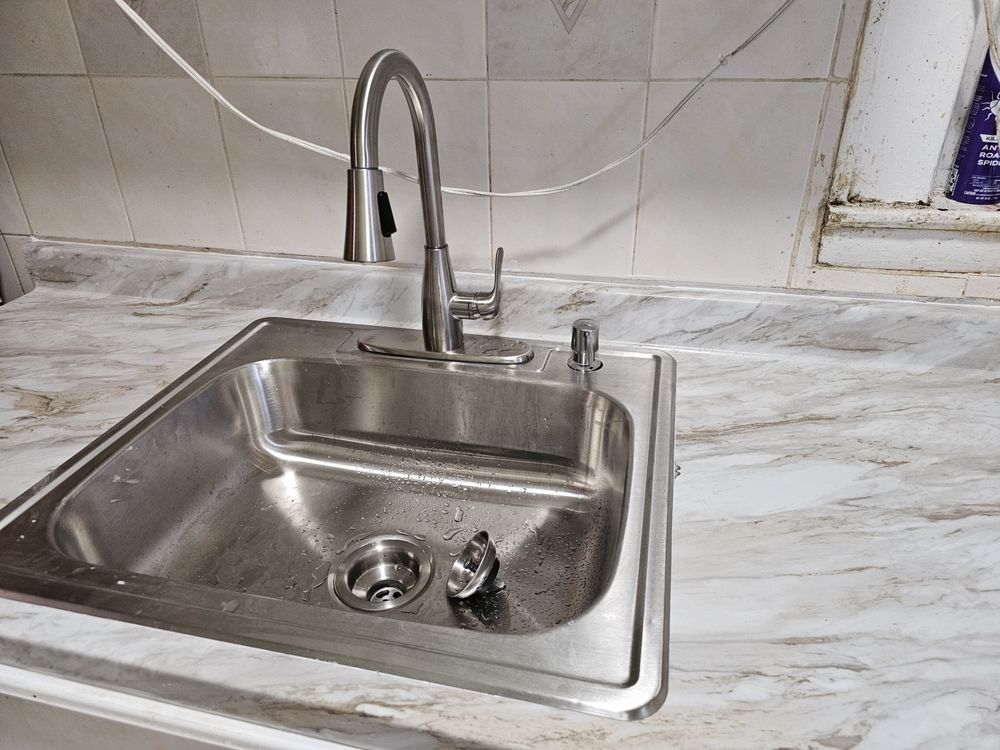 Slide of The Faucet Experts