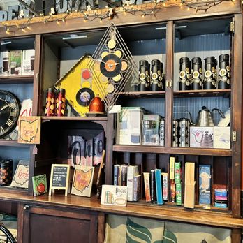 Open Door Coffee Company - Bookshelf of books and games to borrow as well as merchandise for purchase - Coffee & Tea Near Me - Hudson, Ohio Open Door Coffee Company - Bookshelf of books and games to borrow as well as merchandise for purchase - Coffee & Tea Near Me - Hudson, Ohio