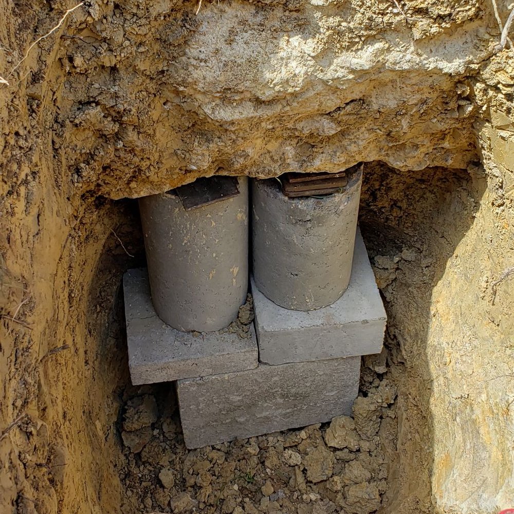 Done Right Foundation Repair - 6 to 9 clinder piers drove down below this cap thingy - Foundation Repair Near Me - San Antonio, Texas