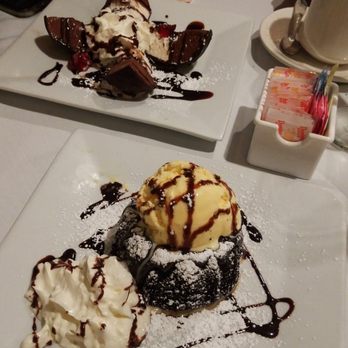 Gran Paradiso - Chocolate lava cake and tartufo in the back - Italian Near Me - Island Park, New York Gran Paradiso - Chocolate lava cake and tartufo in the back - Italian Near Me - Island Park, New York