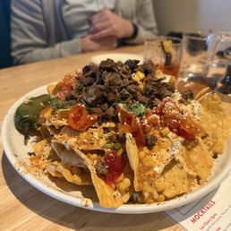 Elote nachos with carne asada