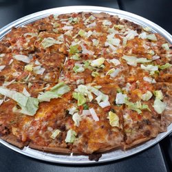 Hall's Kitchen Mishawaka - Taco pizza with light lettuce.