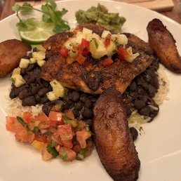 Blackened sheepshead, black beans and rice, pico, mango salsa, and guacamole. Blackened sheepshead, black beans and rice, pico, mango salsa, and guacamole.