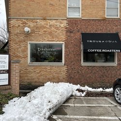 Troubadour Coffee Roasters - Side of building from parking lot