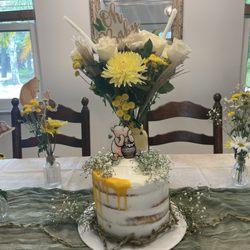 Madelyn's Cake - I loved it . Cake was perfect. I just added the baby breath flowers and Winnie the Pooh topper.